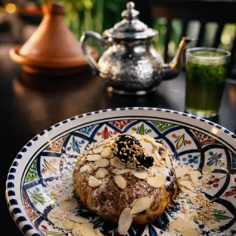 Moroccan tea service and tagine at Moltaqa, a Michelin-recommended Moroccan restaurant in Vancouver